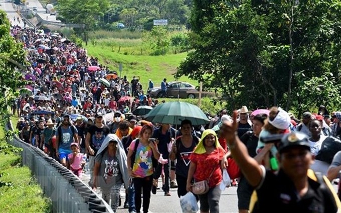Migrantes en el municipio mexicano de Huixtla, estado de Chiapas, de camino a Estados Unidos. (Foto: AFP/VNA)