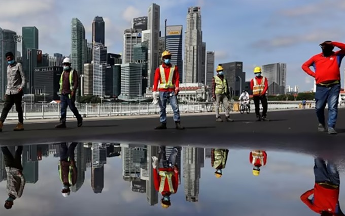 Trabajadores migrantes en Singapur. (Fotografía: Getty Images)